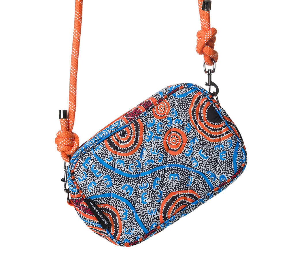 Rope Cross Body Bag on a white background featuring Aboriginal Artwork by Nigel Marshall from Warlukurlangu Artists.