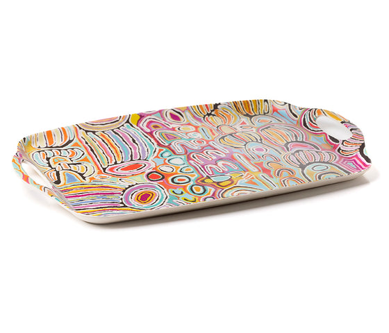 A rectangular bamboo/melamine serving tray with integrated side handles, featuring Aboriginal artwork by Judy Napangardi Watson from Warlukurlangu Artists. Image on a white background.